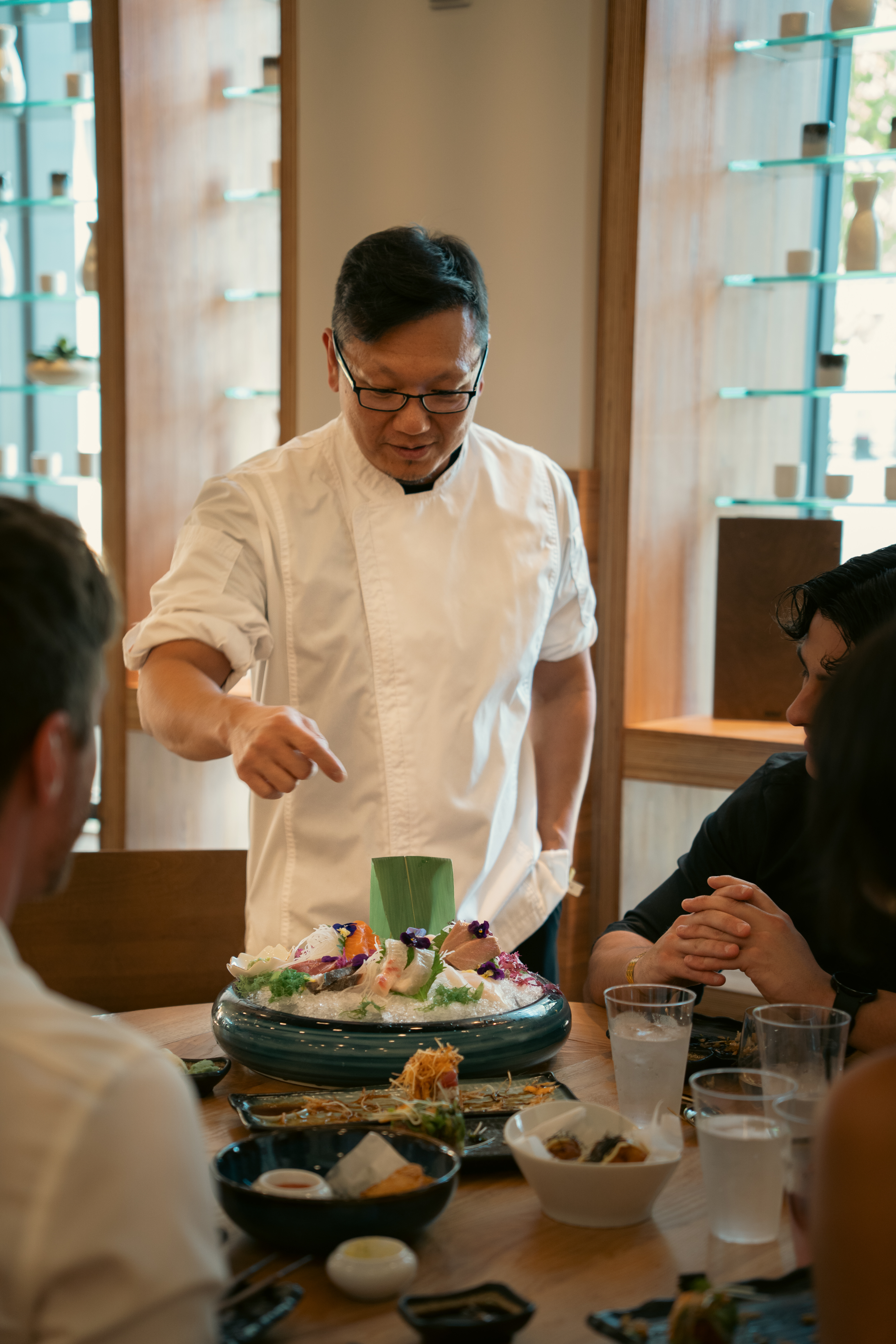 Chef Bobby presenting the sashimi platter at Kawa omakase counter